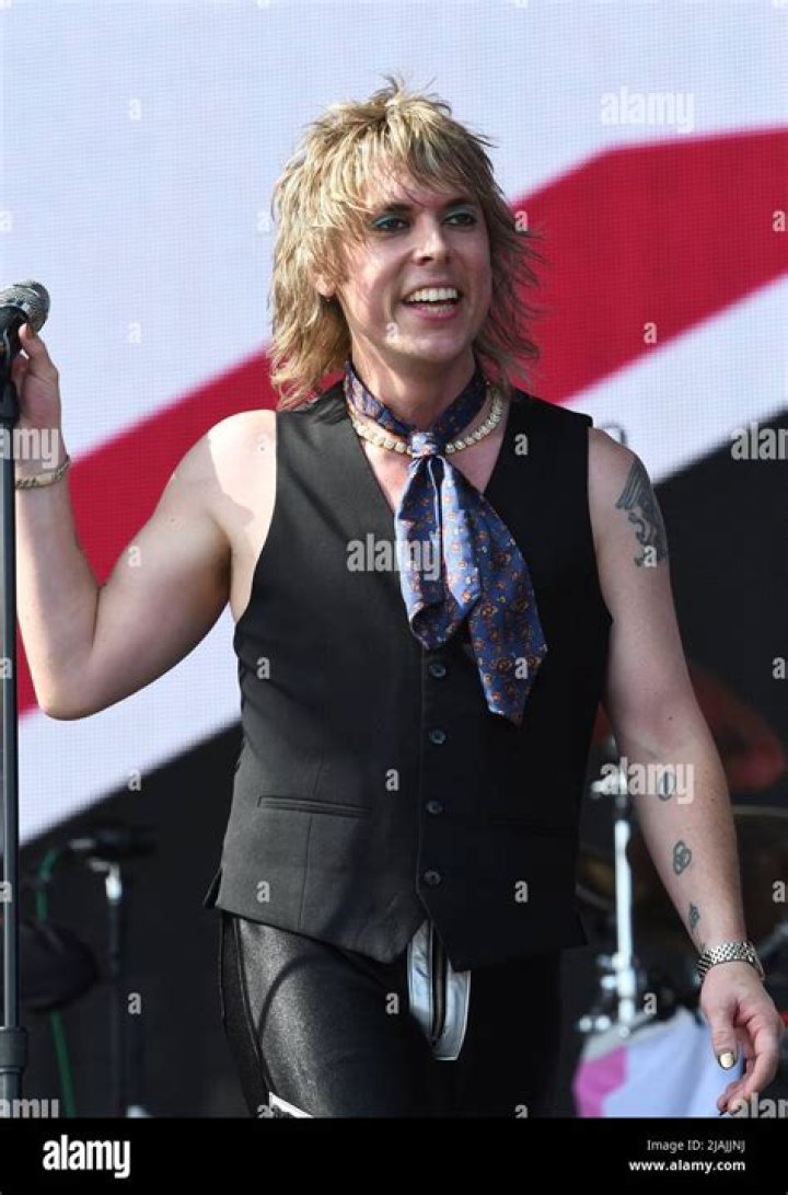 Lead singer Luke Spiller is shown performing on stage during a live