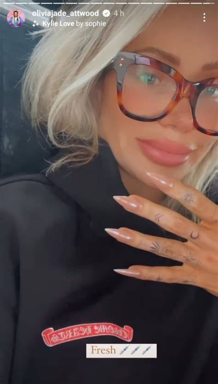 Olivia Attwood holds hands with fianc&eacute; Bradley Dack after dinner date