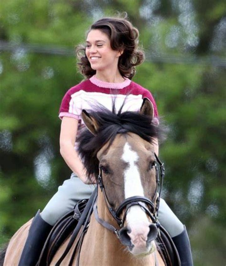 SABRINA BARTLETT Riding a Horse on the Set of The Larkins in London 05
